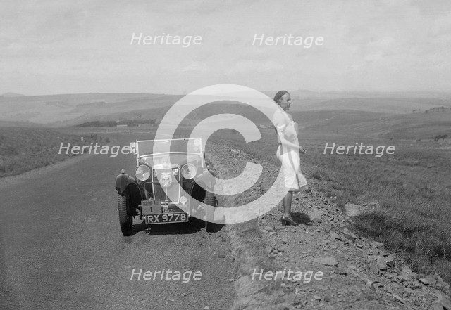 Kitty Brunell and her MG Magna at the RSAC Scottish Rally, 1932. Artist: Bill Brunell.