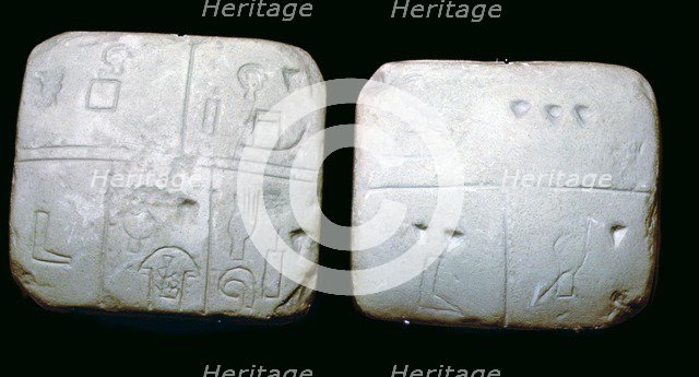 Early Sumerian stone tables, inscribed with very early archaic pictographic symbols. Artist: Unknown