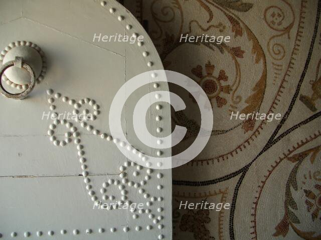 Studded door and mosaic, El Jem Museum, El Djem, Tunisia, 2009. Creator: Amanda Waite.