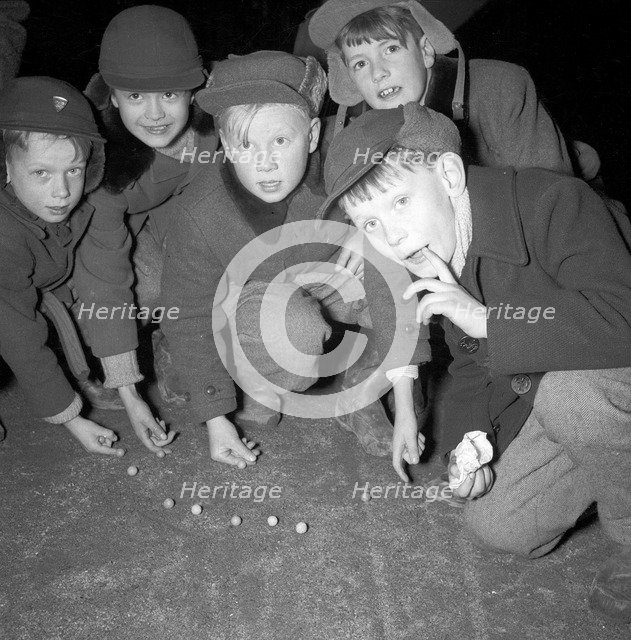 Five boys play marbles, Landskrona, Sweden, 1955. Artist: Unknown