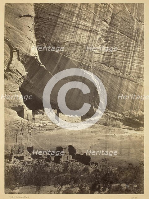 Ancient Ruins in the Cañon de Chelle, N.M. In a niche 50 feet above present Cañon bed., 1873. Creator: Tim O'Sullivan.