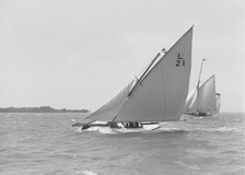 The 6 Metre 'Cheetal' (L21) sailing upwind, 1911. Creator: Kirk & Sons of Cowes.