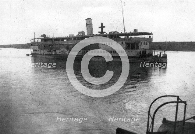Red Cross river boat going up the Tigris River, Mesopotamia, WWI, 1918. Artist: Unknown