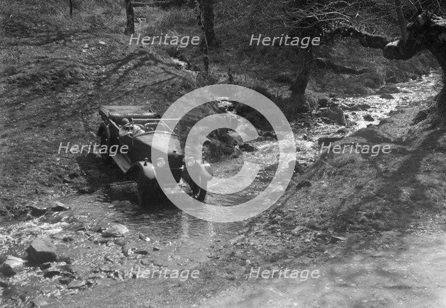 Kitty Brunell road testing a Riley 9 WD tourer, c1930. Artist: Bill Brunell.