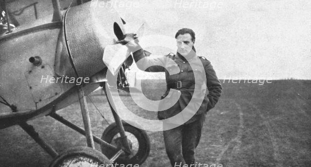 ''Un vainqueur; Jean Navarre, alors adjudant, devant son appareil', 1916. Creator: Unknown.