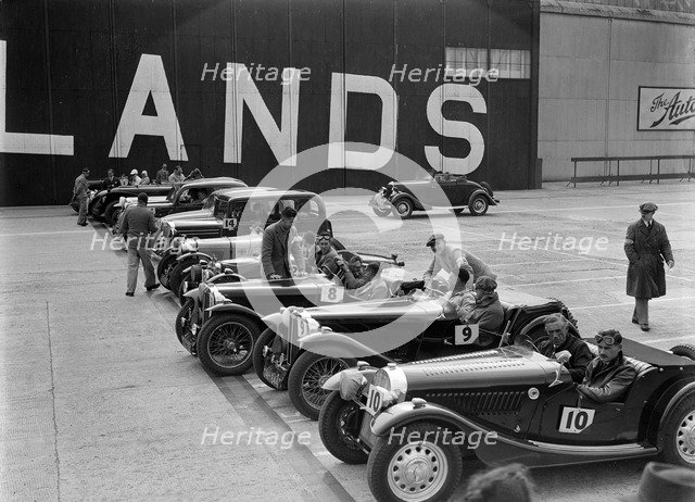 Cars on the start line at the MCC Members Meeting, Brooklands, 10 September 1938. Artist: Bill Brunell.