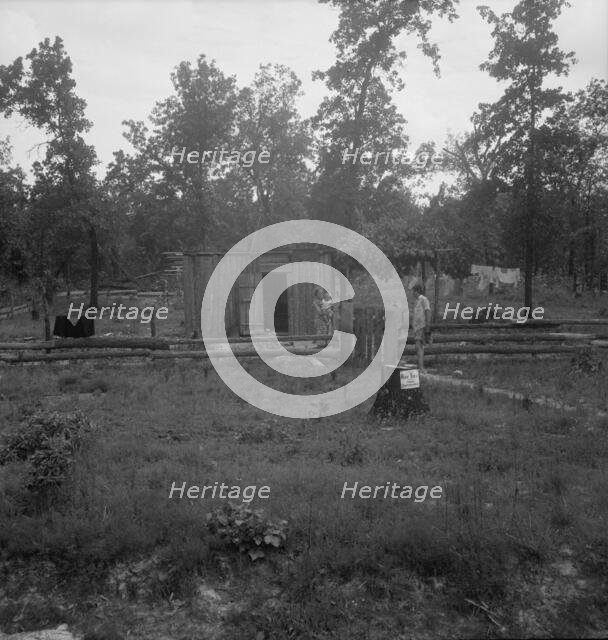 Slab house in clearing east of Atoka, Oklahoma, Atoka County, 1938. Creator: Dorothea Lange.