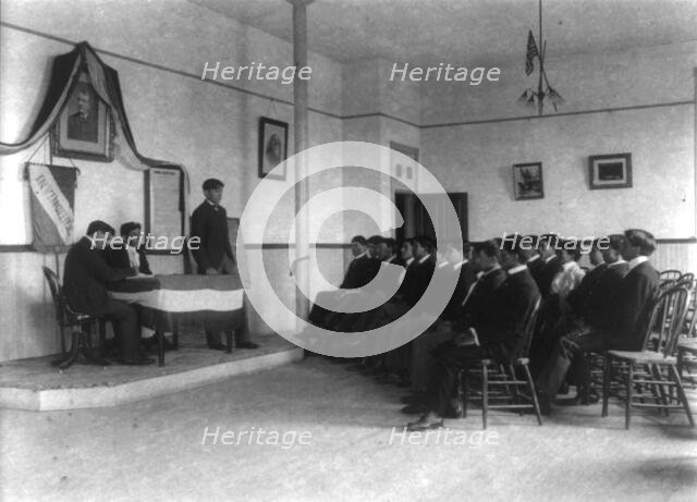 Carlisle Indian School, Carlisle, Pa. Classroom debate by debating society, 1901. Creator: Frances Benjamin Johnston.