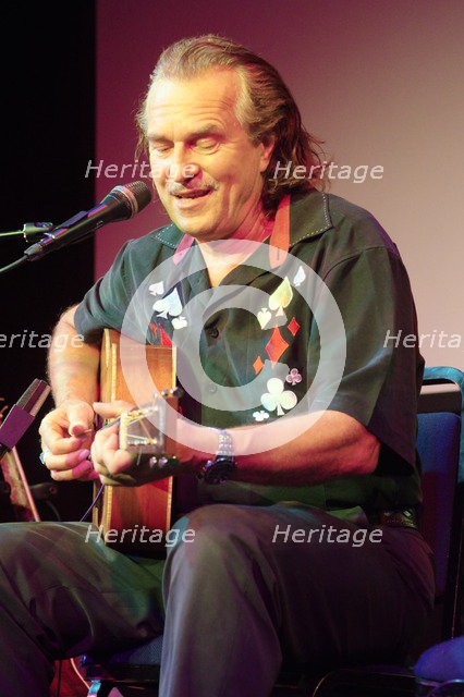 Hans Theessink, Hawth, Crawley, West Sussex, 2014.  Artist: Brian O'Connor.