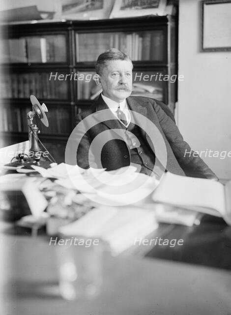 Edward B. Moore, Commissioner of Patents - At Desk, 1912. Creator: Harris & Ewing.