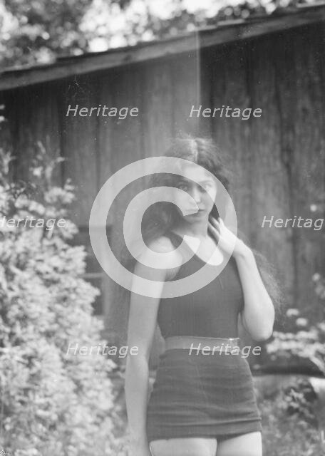 Anisfeld, Miss, standing outdoors, 1928 July 15. Creator: Arnold Genthe.