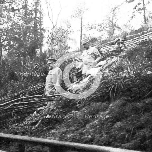 'M. Poincare, le Ministre de la Guerre et le general Joffre sur le front de la Somme; Depart...,1916 Creator: Unknown.