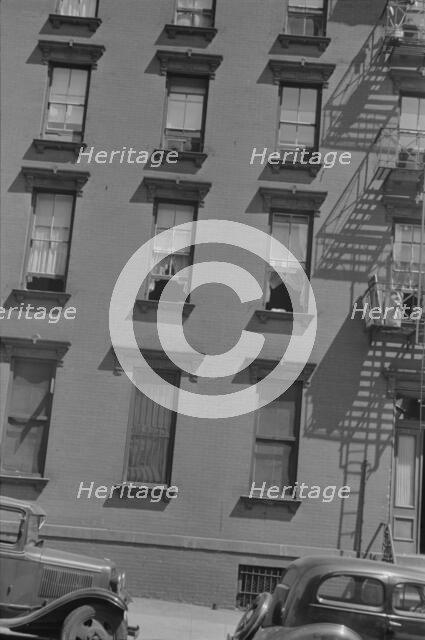 House fronts, 61st Street between 1st and 3rd Avenues, New York, 1938. Creator: Walker Evans.