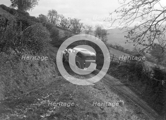 1934 Standard Sixteen taking part in a Standard Car Owners Club trial. Artist: Bill Brunell.