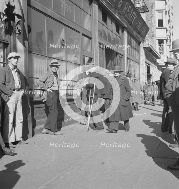 Skid Row, Howard Street, the street of the unemployed in San Francisco, California, 1937. Creator: Dorothea Lange.