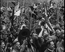 Large Numbers of Boy Scouts and Male Civilians Cheering at Jamboree, 1929. Creator: British Pathe Ltd.