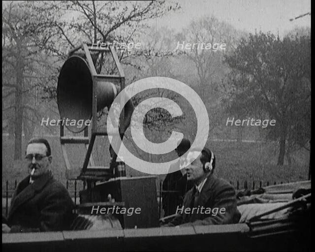 A Car on the Road Equipped with a Radio, an Aerial, and Speakers, 1922. Creator: British Pathe Ltd.
