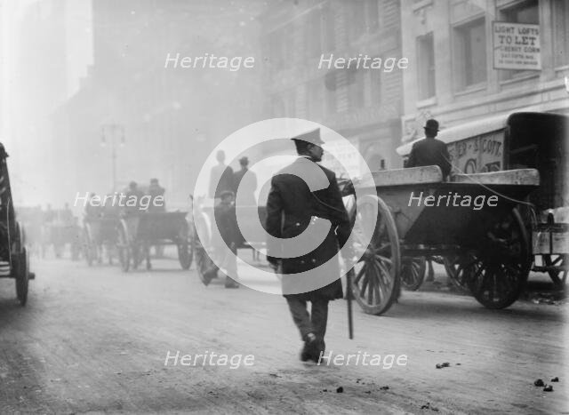 Police protecting garbage carts, 1911. Creator: Bain News Service.