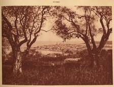 'View through the olives-trees to Antibes', 1930. Creator: Unknown.