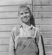 One of the younger Cleaver boys on new farm in Malheur County, Oregon, 1939. Creator: Dorothea Lange.
