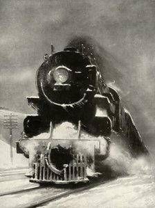 'The fury of the blizzard makes no impression on this mammoth locomotiv', 1935. Creator: Unknown.