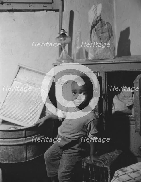 A young boy who lives near the nation's capitol, Washington, D.C, 1942. Creator: Gordon Parks.