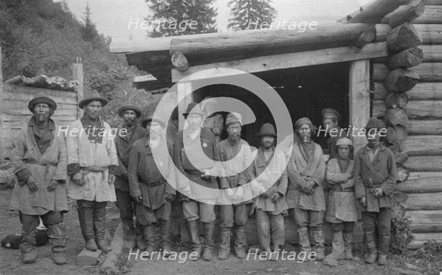 Group of Shoria Men with Village Headmen by a House, 1913. Creator: GI Ivanov.