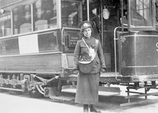 A tram conductor in her winter uniform, possibly in Glasgow, 1915. Artist: Unknown