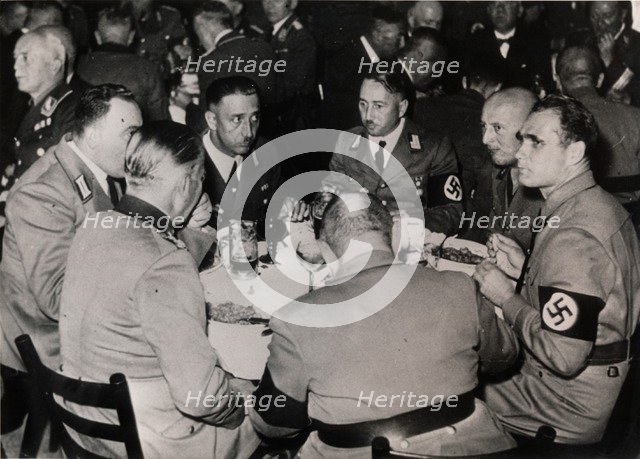 Nazi Deputy Leader Rudolf Hess with party colleagues, Bürgerbräukeller, Munich, October 1937. Artist: Unknown