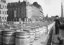 Evaporated milk in barrels for export on the quayside, Malmö, Sweden, May 1947. Artist: Otto Ohm
