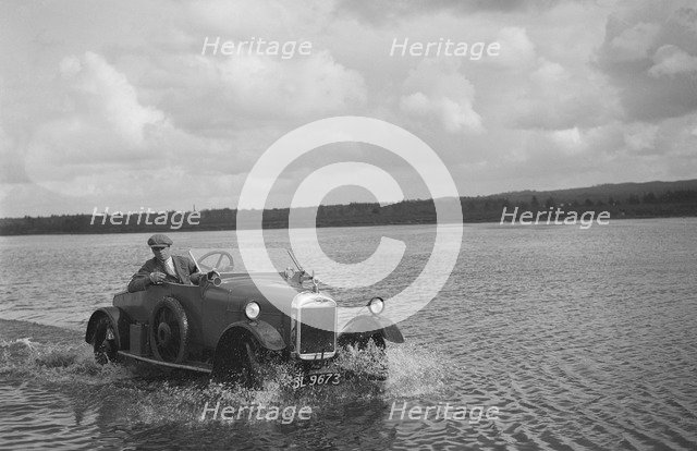 HG Pope driving a GWK through water at a demonstration event, Frensham Common Pond, Surrey, 1922. Artist: Bill Brunell.