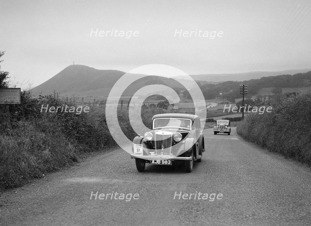 MG VA of RK Wellsteed ahead of a Wolseley saloon at the South Wales Auto Club Welsh Rally, 1937 Artist: Bill Brunell.
