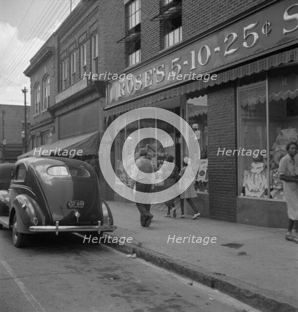 The main street, Fayetteville Street, of Siler City, North Carolina, 1939. Creator: Dorothea Lange.