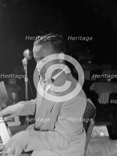 Portrait of Erskine Butterfield, Brown Derby(?), Washington, D.C., ca. Mar. 1942. Creator: William Paul Gottlieb.