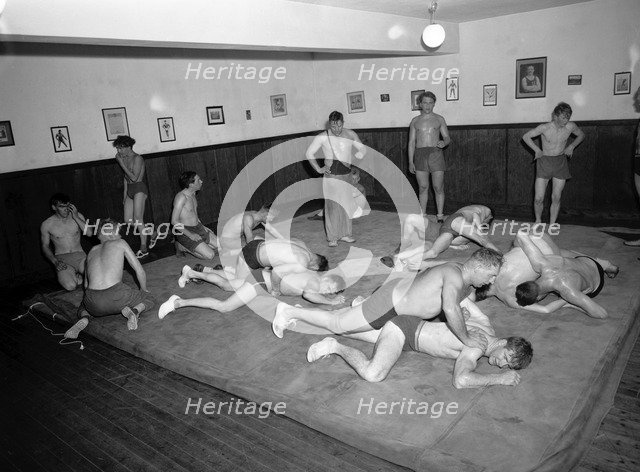 Argos, the wrestling Club of Landskrona, Sweden, in training, 1954 Artist: Unknown
