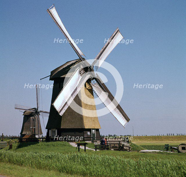 Windmills in Holland. Artist: Unknown