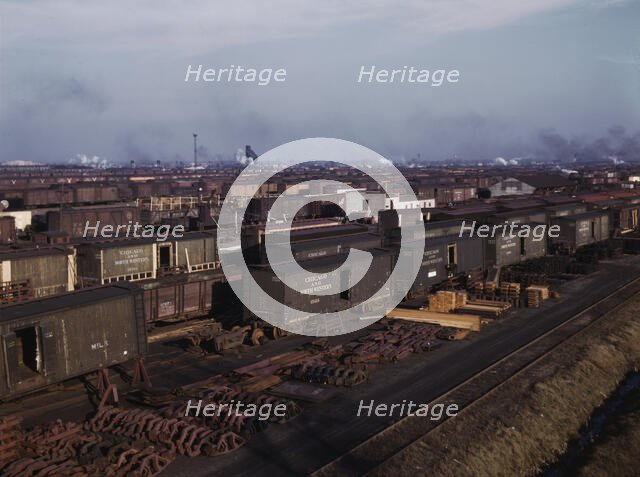 Freight cars being maneuvered in a Chicago and North Western railroad yard, Chicago, Ill., 1942. Creator: Jack Delano.