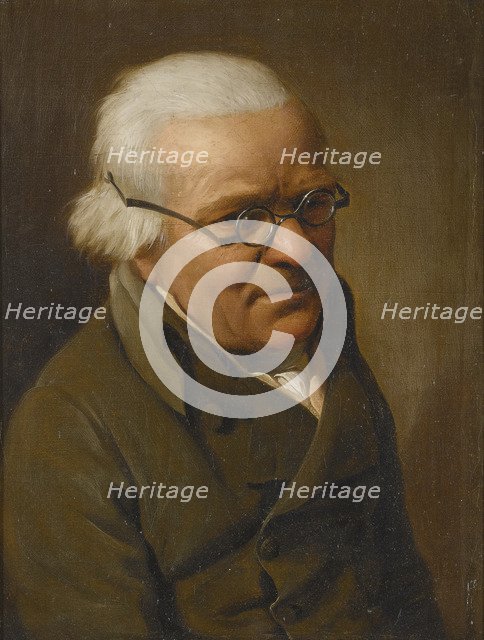 Portrait of a man wearing glasses.