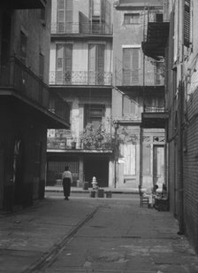 Cathedral Alley, New Orleans, between 1920 and 1926. Creator: Arnold Genthe.