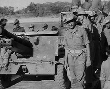 Troops Standing by an Artillery Gun on ‘Grub Bridge’, 1943. Creator: British Pathe Ltd.