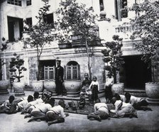 Prince Chulalongkorn of Siam (Thailand) (seated, centre), with Prince Bhanugrangsi..., 1866. Creator: John Thomson.