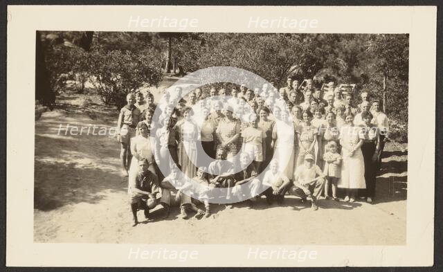 Group Portrait in Orchard, 1907-1943. Creator: Louis Fleckenstein.
