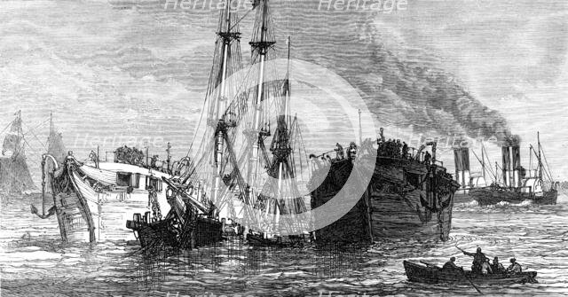 Raising a sunken Indiaman in the Thames, near Gravesend, 1874. Creator: Unknown.