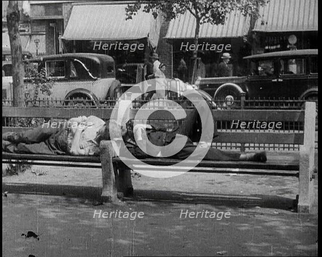 Unemployed People Lying On a Bench, 1932. Creator: British Pathe Ltd.