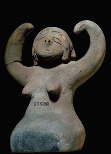 Egyptian figure of baked clay. Artist: Unknown