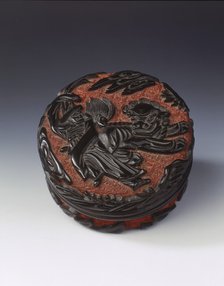 Carved black lacquer covered box on red ground, Ming dynasty, China, late 15th-early 16th century. Artist: Unknown