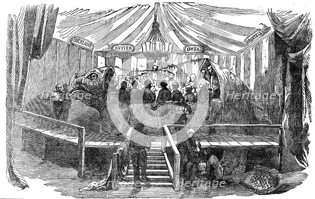 Naturalists dining inside a model of a dinosaur, Crystal Palace, Sydenham, New Year's Eve, 1853. Artist: Unknown