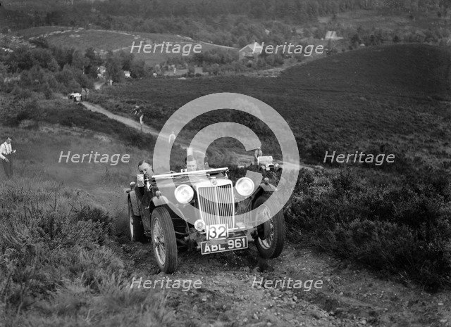 1936 MG TA of the Three Musketeers team taking part in the NWLMC Lawrence Cup Trial, 1937. Artist: Bill Brunell.