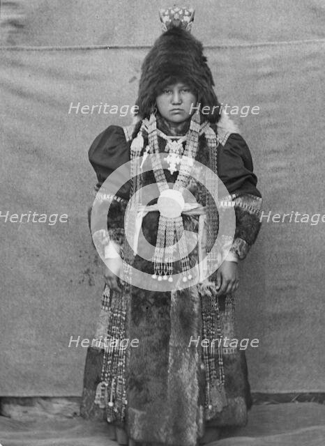 Yakut woman in festive attire, 1890. Creator: Unknown.