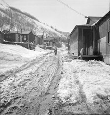 Main street in a Utah coal mining settlement, Consumers, near Price, Utah, 1936. Creator: Dorothea Lange.